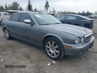 2004 Jaguar XJ with VIN SAJEA74C94SG10199, listed as a IAAI auction lot 42007186 with 138,807 mi miles and . Bid and sale history available at DreamBid. Image 1.