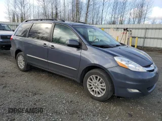 2010 Toyota Sienna XLE with VIN 5TDDK4CC0AS032292, listed as a Copart auction lot 48085825 with 127,599 mi miles and Clean title. Bid and sale history available at DreamBid. Image 4.