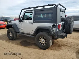 2009 Jeep Wrangler X with VIN 1J4FA24199L787574, listed as a Copart auction lot 58189835 with 74,331 mi miles and Salvage title. Bid and sale history available at DreamBid. Image 2.