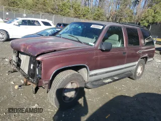 1997 GMC Yukon with VIN 1GKEK13R1VJ702558, listed as a Copart auction lot 85930054 with 165,837 mi miles and Salvage Title. Bid and sale history available at carsss.com. Image 1.