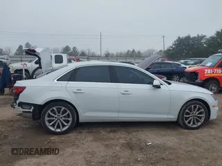 2019 Audi A4 Premium z VIN WAUGMAF4XKN004563, wystawiony jako IAAI lot #41637446 z przebiegiem 19 748 mil mil oraz . Historia ofert i sprzedaży dostępna na DreamBid. Obrazek 14.