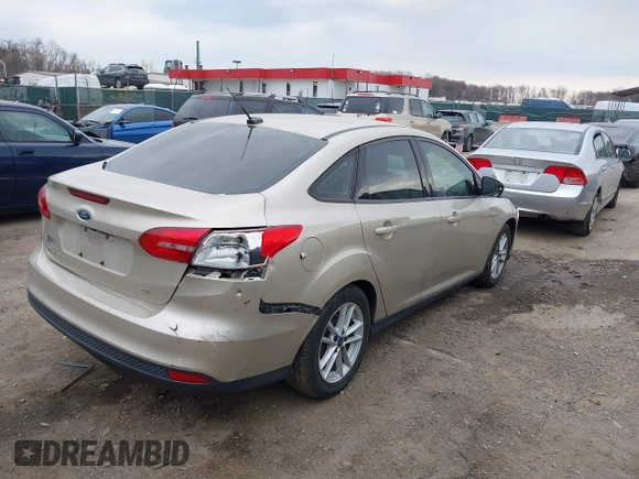2017 Ford Focus SE with VIN 1FADP3F28HL252411, listed as a IAAI auction lot 41888738 with 103,981 mi miles. Bid and sale history available at carsss.com. Image 4.