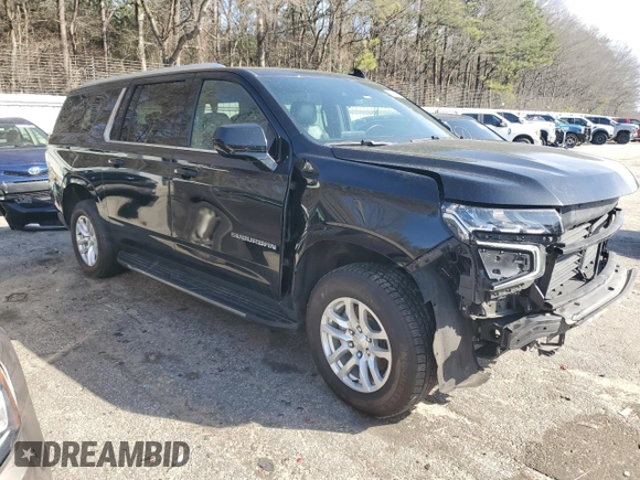 2023 Chevrolet Suburban LS with VIN 1GNSCBKD8PR163178, listed as a Copart auction lot 47844175 with 104,369 mi miles and Salvage Title. Bid and sale history available at DreamBid. Image 4.