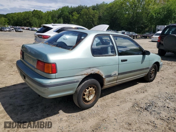 1992 Toyota Tercel z VIN JT2EL43B1N0209927, wystawiony jako Copart lot #57595275 z przebiegiem 87 577 mil mil oraz Tytuł czysty. Historia ofert i sprzedaży dostępna na DreamBid. Obrazek 3.