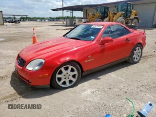 2000 Mercedes-Benz SLK 230 Kompressor with VIN WDBKK47F2YF156715, listed as a Copart auction lot 63873805 with 140,706 mi miles and Salvage title. Bid and sale history available at DreamBid. Image 1.