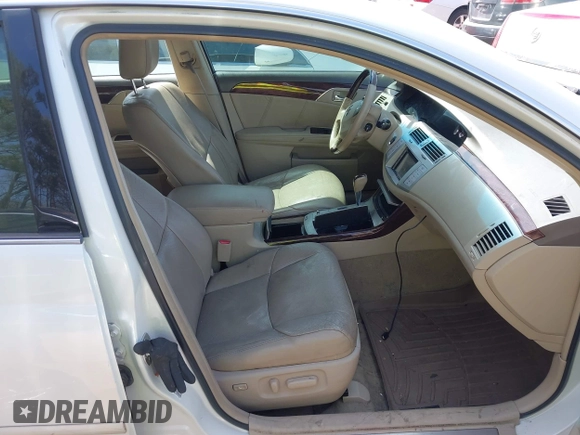 2010 Toyota Avalon XL with VIN 4T1BK3DB6AU363456, listed as a IAAI auction lot 41909395 with 251,402 mi miles and . Bid and sale history available at DreamBid. Image 5.