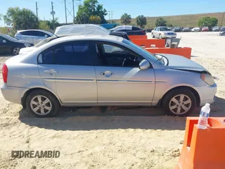 2008 Hyundai Accent GLS with VIN KMHCN46CX8U214890, listed as a IAAI auction lot 41843006 with 179,550 mi miles. Bid and sale history available at carsss.com. Image 13.