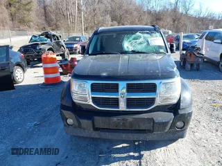 2007 Dodge Nitro SLT with VIN 1D8GU58K67W688374, listed as a IAAI auction lot 41392892 with 97,402 mi miles. Bid and sale history available at carsss.com. Image 12.