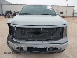 2023 Ford F-150 Lightning Pro z VIN 1FTVW1EL7PWG19070, wystawiony jako IAAI lot #41536193 z przebiegiem 22 654 mil mil oraz . Historia ofert i sprzedaży dostępna na DreamBid. Obrazek 13.