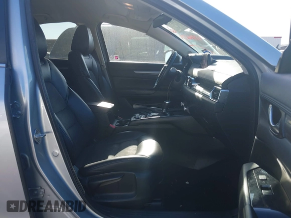 2020 Mazda CX-5 Touring with VIN JM3KFACMXL1786200, listed as a IAAI auction lot 41506139 with 121,944 mi miles. Bid and sale history available at carsss.com. Image 5.
