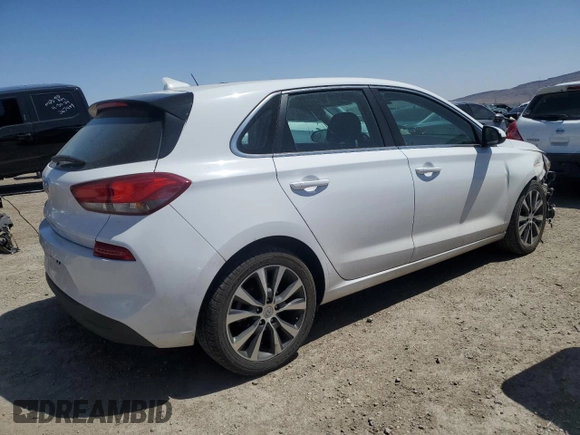 2018 Hyundai Elantra GT with VIN KMHH35LE0JU074104, listed as a Copart auction lot 55727404 with 34,769 mi miles and Salvage Title. Bid and sale history available at carsss.com. Image 3.