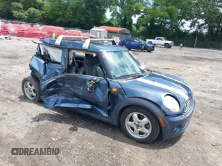 2009 MINI Hardtop with VIN WMWMF33509TU74290, listed as a IAAI auction lot 42538919 with 104,209 mi miles and . Bid and sale history available at DreamBid. Image 1.