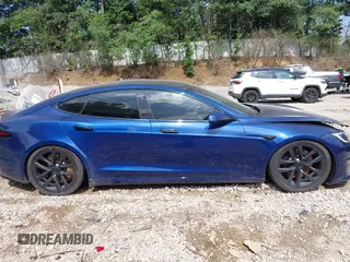 2022 Tesla Model S with VIN 5YJSA1E55NF486443, listed as a IAAI auction lot 42720110 with Not provided miles and . Bid and sale history available at DreamBid. Image 14.