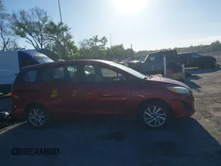 2014 Mazda Mazda5 Sport with VIN JM1CW2BLXE0163650, listed as a IAAI auction lot 42024762 with 137,314 mi miles. Bid and sale history available at carsss.com. Image 13.