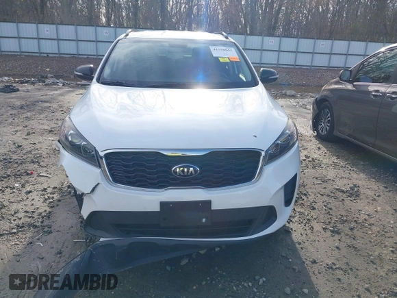 2019 Kia Sorento LX with VIN 5XYPG4A54KG599963, listed as a IAAI auction lot 41558055 with 119,238 mi miles and . Bid and sale history available at DreamBid. Image 12.