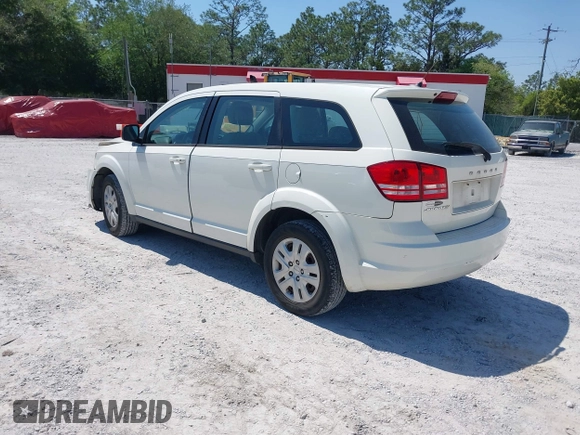 2015 Dodge Journey SE z VIN 3C4PDCAB7FT572716, wystawiony jako IAAI lot #42010091 z przebiegiem 186 489 mil mil oraz . Historia ofert i sprzedaży dostępna na DreamBid. Obrazek 3.