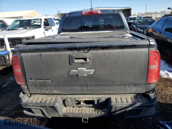 2015 Chevrolet Colorado 4WD WT with VIN 1GCGTAE32F1191129, listed as a Copart auction lot 42255765 with 106,516 mi miles and Salvage Title. Bid and sale history available at DreamBid. Image 6.