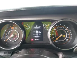2023 Jeep Wrangler Sport S with VIN 1C4HJXDG0PW638871, listed as a IAAI auction lot 42129295 with 16,171 mi miles and . Bid and sale history available at DreamBid. Image 7.