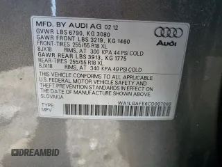 2012 Audi Q7 Premium Plus z VIN WA1LGAFE6CD007088, wystawiony jako Copart lot #57697315 z przebiegiem 154 956 mil mil oraz Czysty tytuł • Clean title. Historia ofert i sprzedaży dostępna na DreamBid. Obrazek 13.