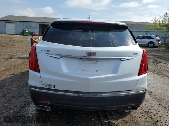 2017 Cadillac XT5 FWD with VIN 1GYKNARS0HZ157551, listed as a Copart auction lot 55281725 with 144,077 mi miles and Clean title. Bid and sale history available at DreamBid. Image 6.
