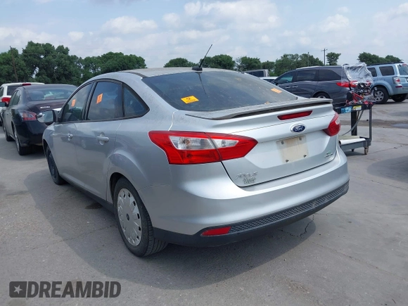 2013 Ford Focus SE with VIN 1FADP3F25DL138117, listed as a IAAI auction lot 42162119 with 136,979 mi miles. Bid and sale history available at carsss.com. Image 3.