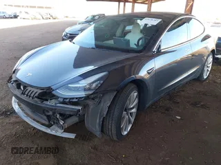 2018 Tesla Model 3 Long Range Battery with VIN 5YJ3E1EA3JF169132, listed as a IAAI auction lot 41678383 with 170,809 mi miles and . Bid and sale history available at DreamBid. Image 18.