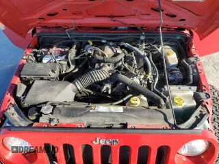 2009 Jeep Wrangler X with VIN 1J4FA24199L720554, listed as a Copart auction lot 88129665 with 67,840 mi miles and Salvage title. Bid and sale history available at DreamBid. Image 12.