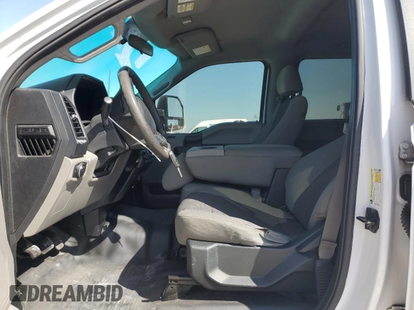 2015 Ford F-150 XLT w/HD Payload Pkg with VIN 1FTFW1EG6FFA02457, listed as a Copart auction lot 52121515 with 242,747 mi miles and Salvage Title. Bid and sale history available at carsss.com. Image 7.