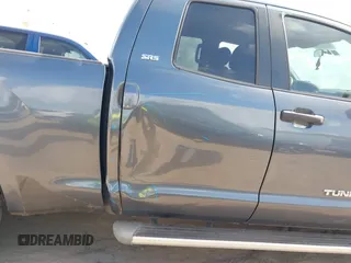 2010 Toyota Tundra z VIN 5TFUW5F13AX138105, wystawiony jako IAAI lot #41499018 z przebiegiem 295 414 mil mil oraz . Historia ofert i sprzedaży dostępna na DreamBid. Obrazek 18.