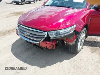 2014 Ford Taurus SEL z VIN 1FAHP2E89EG126922, wystawiony jako IAAI lot #42236235 z przebiegiem 176 917 mil mil oraz . Historia ofert i sprzedaży dostępna na DreamBid. Obrazek 13.