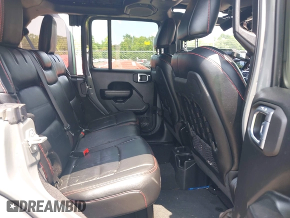 2021 Jeep Wrangler Unlimited Rubicon with VIN 1C4HJXFN3MW816375, listed as a IAAI auction lot 42480514 with 62,324 mi miles and . Bid and sale history available at DreamBid. Image 8.