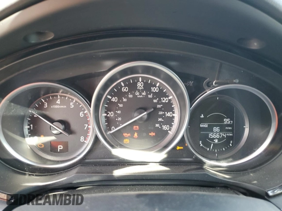 2016 Mazda CX-9 Touring with VIN JM3TCACY3G0115334, listed as a Copart auction lot 64129265 with 156,674 mi miles and Clean title. Bid and sale history available at DreamBid. Image 9.