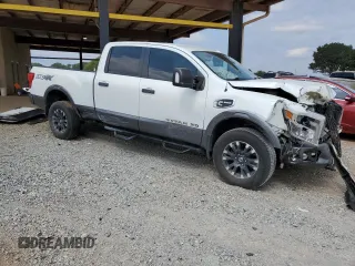 2018 Nissan Titan Platinum Reserve with VIN 1N6BA1F49JN521225, listed as a Copart auction lot 69831004 with 92,536 mi miles and Salvage title. Bid and sale history available at DreamBid. Image 4.