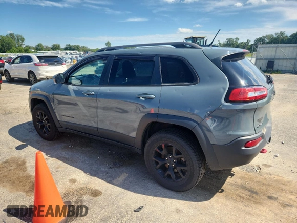 2015 Jeep Cherokee Trailhawk with VIN 1C4PJMBS4FW687328, listed as a Copart auction lot 58927765 with 119,483 mi miles and Non repairable. Bid and sale history available at DreamBid. Image 2.
