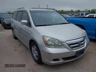 2005 Honda Odyssey EX-L with VIN 5FNRL38625B421123, listed as a IAAI auction lot 41886027 with 174,459 mi miles. Bid and sale history available at carsss.com. Image 1.
