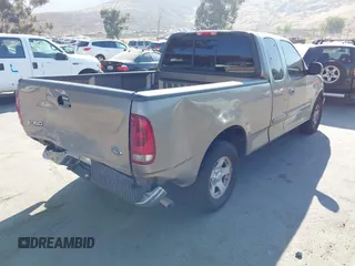 2002 Ford F-150 XL with VIN 1FTRX17WX2NA97846, listed as a IAAI auction lot 42682857 with 185,438 mi miles and . Bid and sale history available at DreamBid. Image 4.