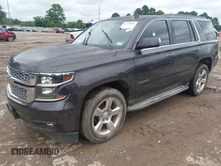 2015 Chevrolet Tahoe LT with VIN 1GNSCBKC4FR183580, listed as a IAAI auction lot 42318000 with Not provided miles and . Bid and sale history available at DreamBid. Image 2.
