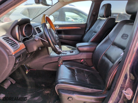 2012 Jeep Grand Cherokee Overland with VIN 1C4RJFCG5CC298516, listed as a Copart auction lot 53164465 with 232,575 mi miles and Clean Title. Bid and sale history available at carsss.com. Image 7.