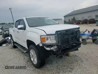 2019 GMC Canyon 4WD SLT with VIN 1GTG6DEN8K1274729, listed as a Copart auction lot 60804575 with 107,382 mi miles and Salvage title. Bid and sale history available at DreamBid. Image 14.