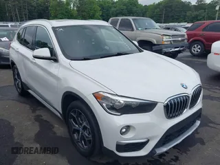 2018 BMW X1 sDrive28i z VIN WBXHU7C30J5L07651, wystawiony jako IAAI lot #42294784 z przebiegiem 114 445 mil mil oraz . Historia ofert i sprzedaży dostępna na DreamBid. Obrazek 1.