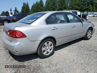 2008 Kia Optima LX z VIN KNAGE123185190108, wystawiony jako Copart lot #59364195 z przebiegiem 131 344 mil mil oraz Szkoda całkowita • Salvage title. Historia ofert i sprzedaży dostępna na DreamBid. Obrazek 3.