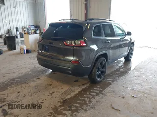 2023 Jeep Cherokee Altitude Lux with VIN 1C4PJMMB7PD107404, listed as a IAAI auction lot 41458661 with 30,683 mi miles. Bid and sale history available at carsss.com. Image 4.