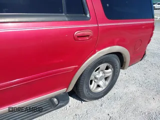 1998 Ford Expedition XLT with VIN 1FMRU17L1WLA47560, listed as a IAAI auction lot 41714605 with 121,523 mi miles. Bid and sale history available at carsss.com. Image 6.