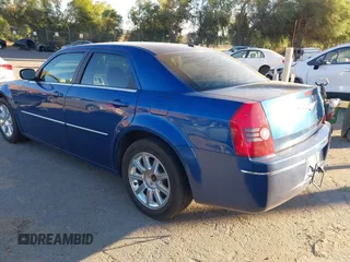 2009 Chrysler 300 Touring with VIN 2C3LA53V89H565270, listed as a IAAI auction lot 41069505 with 112,830 mi miles. Bid and sale history available at carsss.com. Image 3.