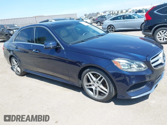 2014 Mercedes-Benz E 350 Sport with VIN WDDHF5KB2EA997989, listed as a IAAI auction lot 42067922 with 57,119 mi miles and . Bid and sale history available at DreamBid. Image 1.