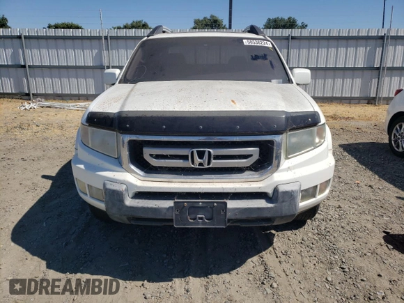 2010 Honda Ridgeline RTL with VIN 5FPYK1F56AB004084, listed as a Copart auction lot 58538224 with 97,558 mi miles and Salvage Title. Bid and sale history available at carsss.com. Image 5.
