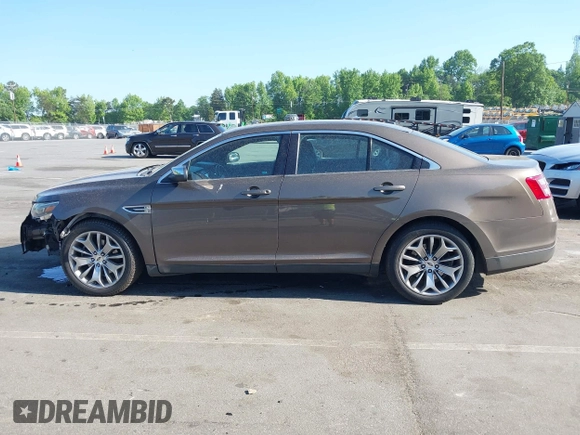 2016 Ford Taurus Limited z VIN 1FAHP2F81GG109548, wystawiony jako IAAI lot #42177871 z przebiegiem 168 611 mil mil oraz . Historia ofert i sprzedaży dostępna na DreamBid. Obrazek 14.