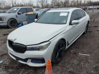 2016 BMW 7 Series 740i with VIN WBA7E2C50GG714647, listed as a IAAI auction lot 41745442 with 134,399 mi miles and . Bid and sale history available at carsss.com. Image 23.