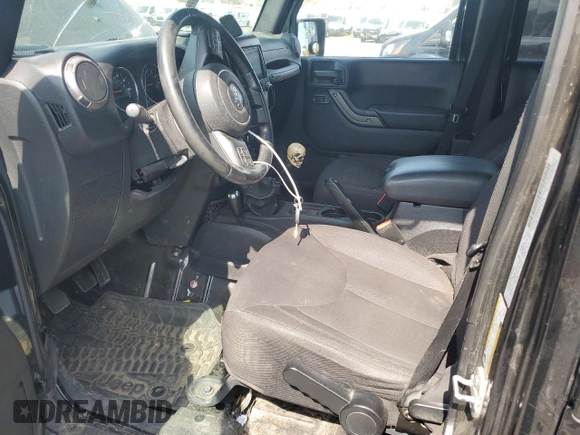 2015 Jeep Wrangler Unlimited Freedom с VIN 1C4BJWDG1FL609850, выставлен на аукционе Copart как лот 55169065 с пробегом 97 415 миль миль и Чистый • Clean title. История ставок и продаж доступна на DreamBid. Изображение 7.