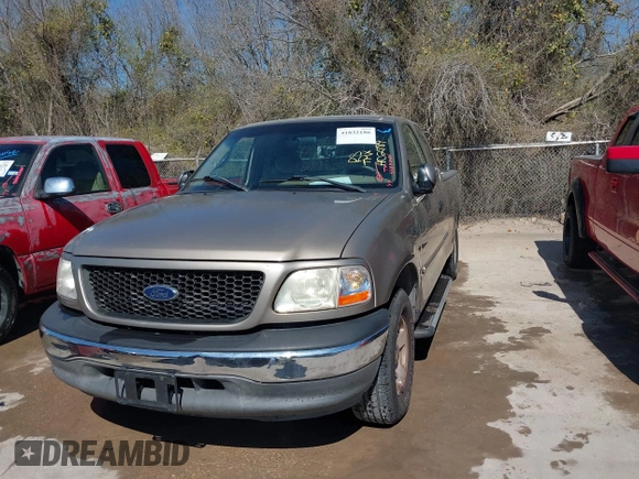 2002 Ford F-150 XL with VIN 1FTRX17242NA02789, listed as a IAAI auction lot 41832186 with 262,253 mi miles. Bid and sale history available at carsss.com. Image 6.